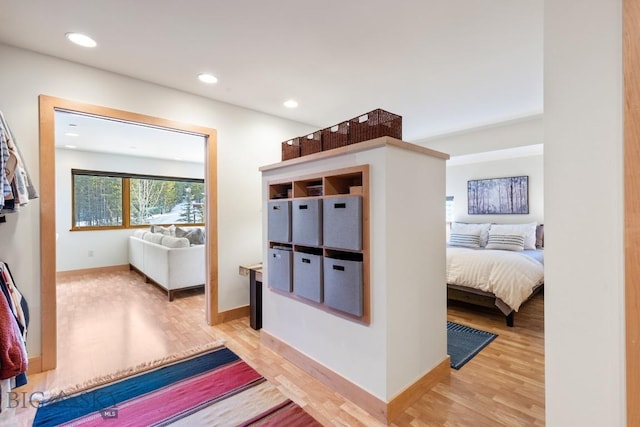 214 W Pine Cone Ter, Big Sky, MT 59716 - hall featuring light wood finished floors and recessed lighting