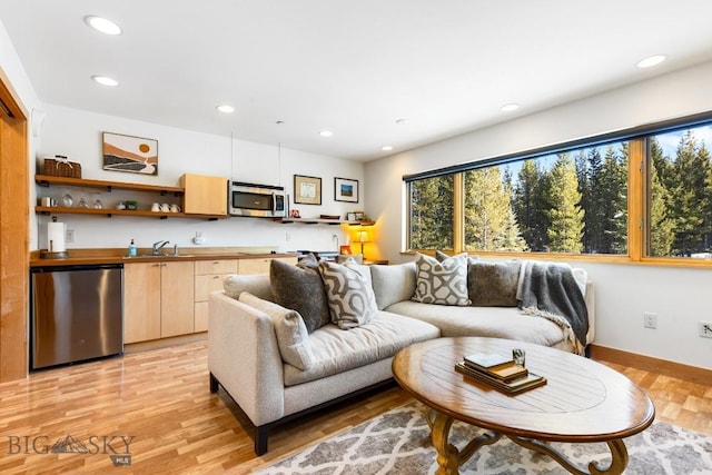 214 W Pine Cone Ter, Big Sky, MT 59716 - living area with recessed lighting and light wood-style flooring