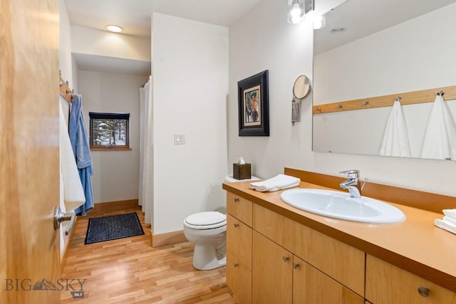 214 W Pine Cone Ter, Big Sky, MT 59716 - full bath with vanity and wood finished floors