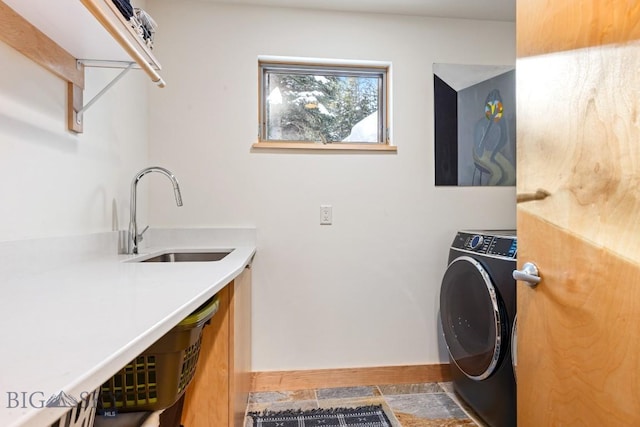 214 W Pine Cone Ter, Big Sky, MT 59716 - laundry room with washer / clothes dryer and baseboards