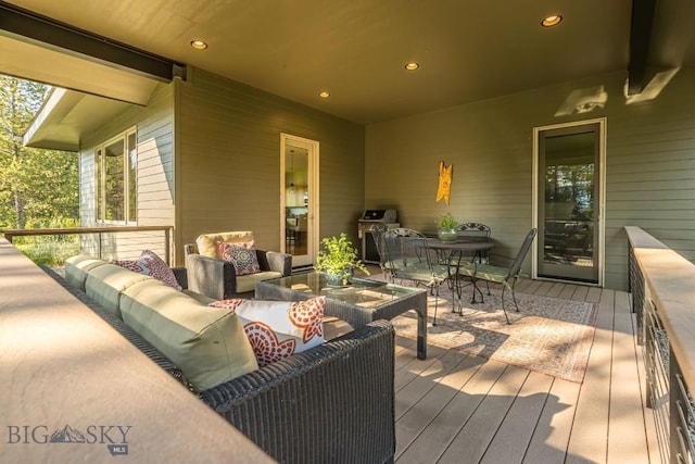 214 W Pine Cone Ter, Big Sky, MT 59716 - wooden deck with outdoor lounge area, outdoor dining space, and a grill