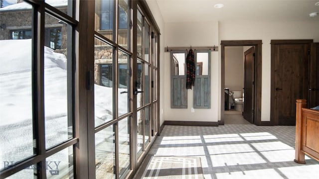 11310 Taiga Trl, Bozeman, MT 59715 - unfurnished sunroom with healthy amount of natural light and french doors