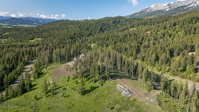 11310 Taiga Trl, Bozeman, MT 59715 - aerial overview of property's location with a heavily wooded area and mountains