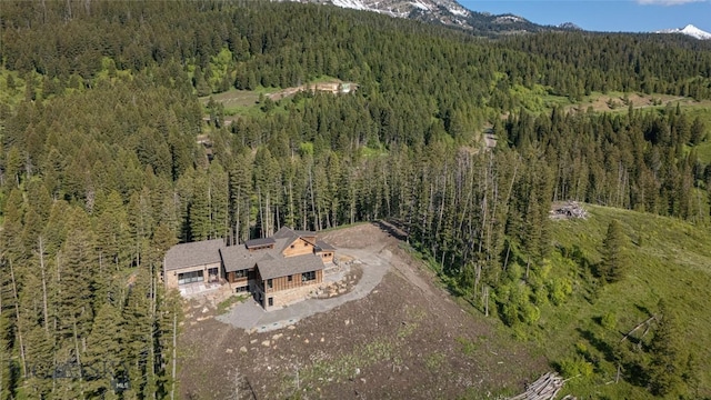 11310 Taiga Trl, Bozeman, MT 59715 - view of property location featuring a heavily wooded area and mountains