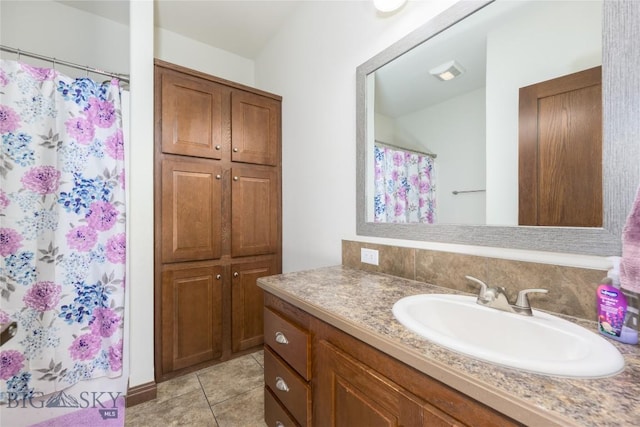 590 Coyote Ln, Butte, MT 59701 - bathroom with vanity, tile patterned floors, and a shower with curtain
