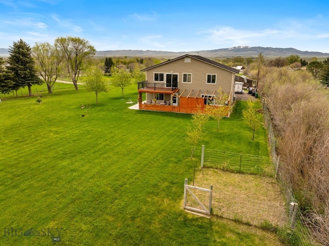 247 Clarks Lookout Rd, Dillon, MT 59725 - back of house featuring a deck with mountain view and a view of rural / pastoral area