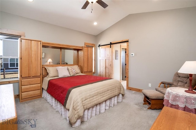 154 Nellie Ct, Manhattan, MT 59741 - bedroom with vaulted ceiling, a barn door, light carpet, recessed lighting, and a ceiling fan