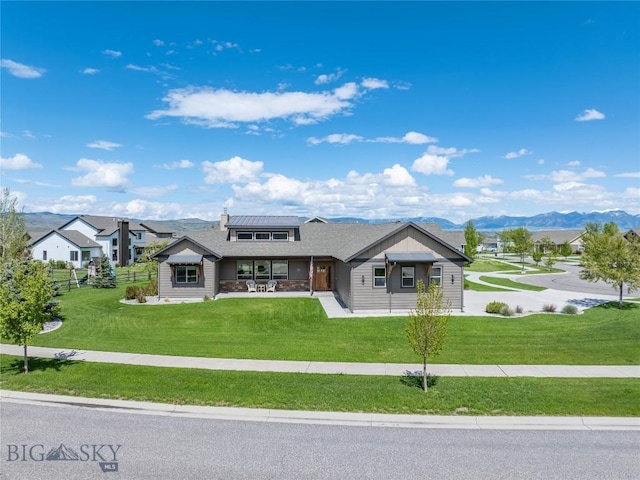 154 Nellie Ct, Manhattan, MT 59741 - ranch-style house with a mountain view and a front lawn