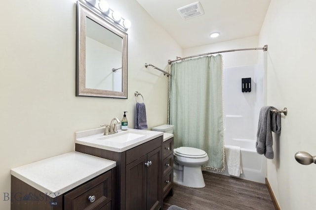 83 Sky Vw, Ennis, MT 59729 - full bathroom with wood finished floors, toilet, vanity, and shower / bath combo
