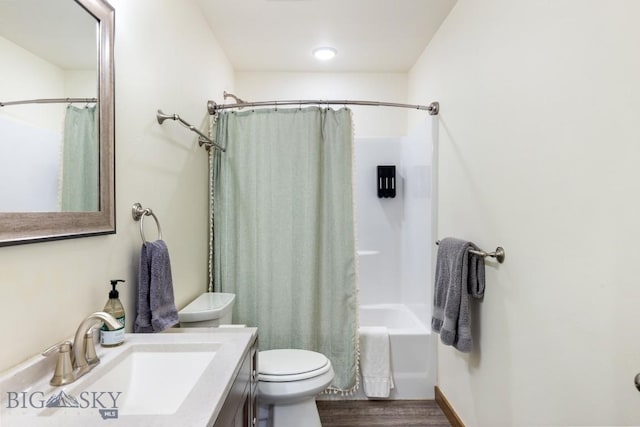 83 Sky Vw, Ennis, MT 59729 - bathroom featuring wood finished floors, toilet, vanity, and shower / bath combination with curtain