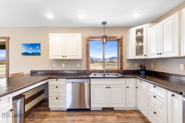 83 Sky Vw, Ennis, MT 59729 - kitchen with dishwasher, dark countertops, white cabinetry, light wood-type flooring, and recessed lighting