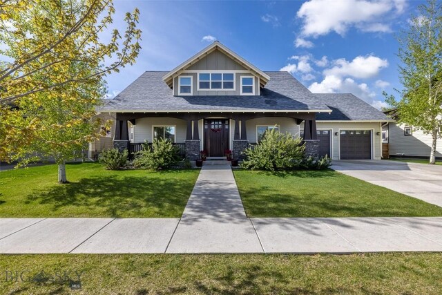 4156 Sunstone St, Bozeman, MT 59718 - craftsman house featuring a front lawn, an attached garage, and concrete driveway