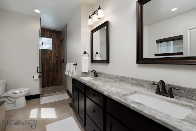 4156 Sunstone St, Bozeman, MT 59718 - full bathroom with a shower stall, double vanity, toilet, and a sink