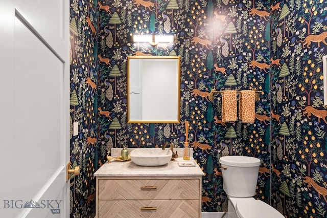 676 Tillyfour, Bozeman, MT 59718 - half bath with vanity and wallpapered walls