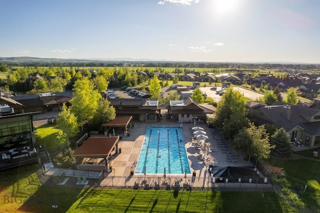 676 Tillyfour, Bozeman, MT 59718 - aerial perspective of suburban area featuring a pool