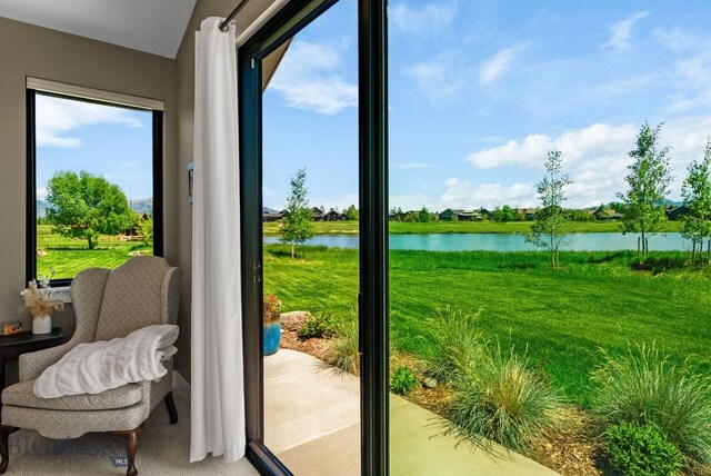 676 Tillyfour, Bozeman, MT 59718 - entryway with a water view and light colored carpet