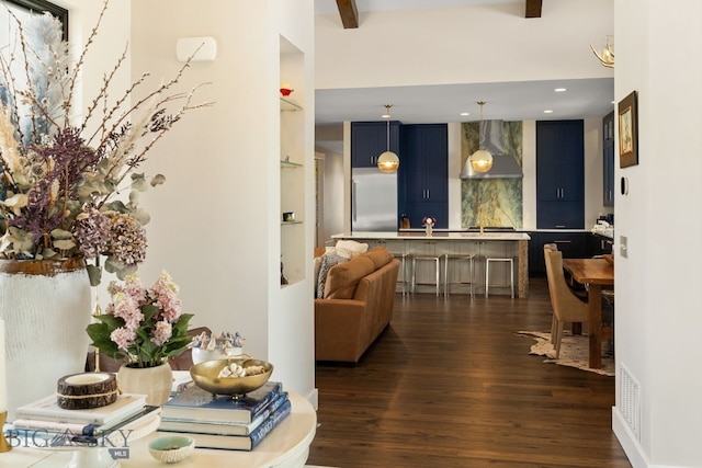 676 Tillyfour, Bozeman, MT 59718 - living area with dark wood-style flooring, recessed lighting, and beam ceiling