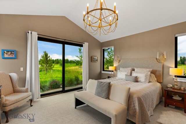 676 Tillyfour, Bozeman, MT 59718 - carpeted bedroom featuring access to outside, a chandelier, multiple windows, and high vaulted ceiling