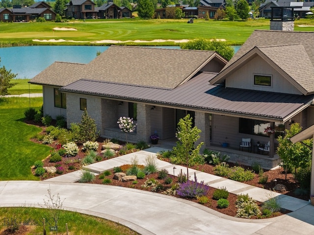 676 Tillyfour, Bozeman, MT 59718 - view of front facade with a porch, a residential view, and a front yard