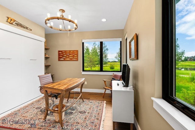 676 Tillyfour, Bozeman, MT 59718 - office featuring a chandelier, plenty of natural light, wood finished floors, and recessed lighting