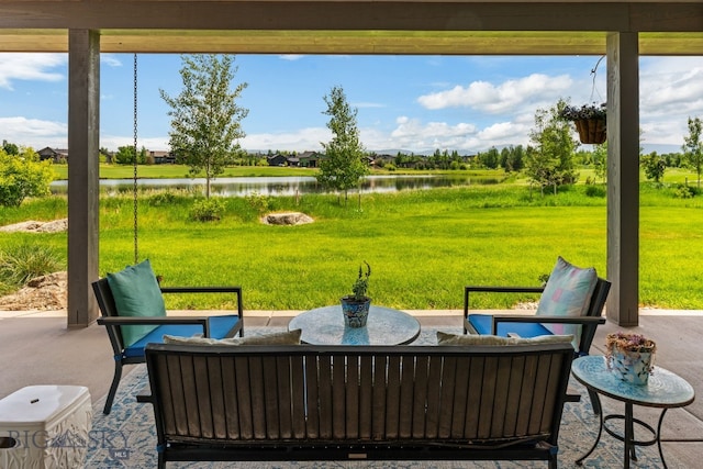 676 Tillyfour, Bozeman, MT 59718 - view of patio / terrace featuring a water view and an outdoor living space