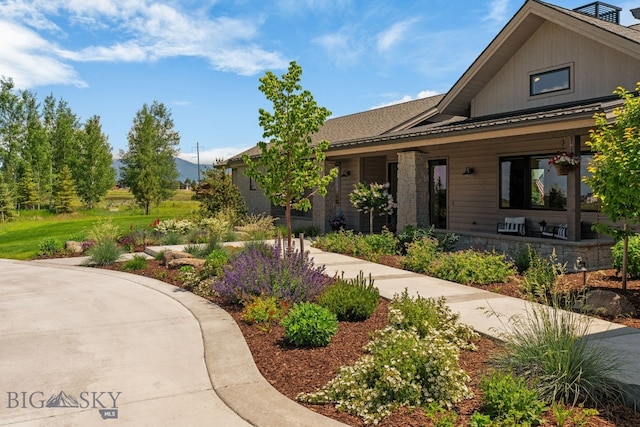 676 Tillyfour, Bozeman, MT 59718 - view of front of property featuring covered porch