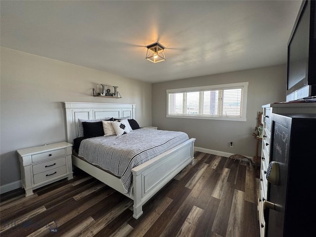 23 Indian Rings Rd, Big Timber, MT 59011 - bedroom with dark wood-style floors and baseboards