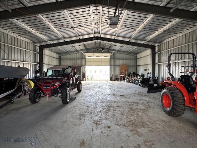 23 Indian Rings Rd, Big Timber, MT 59011 - garage with metal wall and a garage door opener