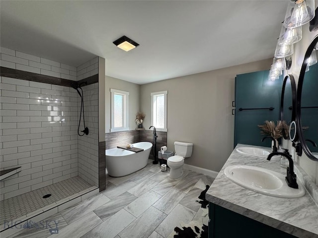 23 Indian Rings Rd, Big Timber, MT 59011 - full bathroom with double vanity, tiled shower, and a soaking tub