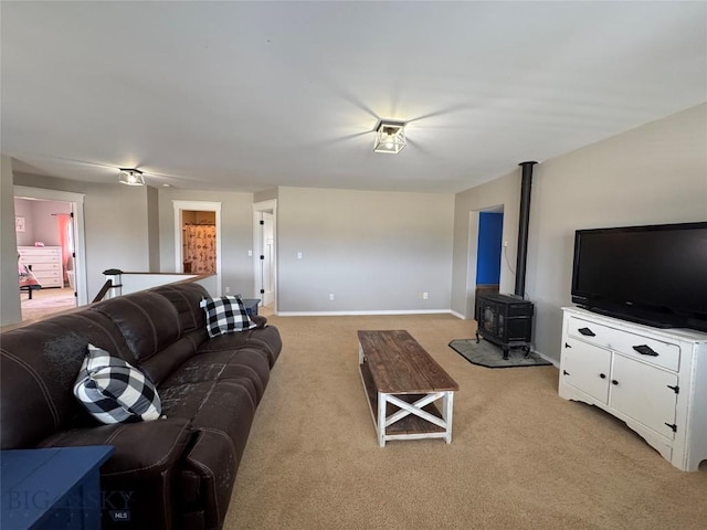 23 Indian Rings Rd, Big Timber, MT 59011 - living area featuring a wood stove and light carpet