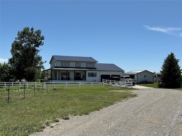 23 Indian Rings Rd, Big Timber, MT 59011 - view of front of property with driveway and a metal roof