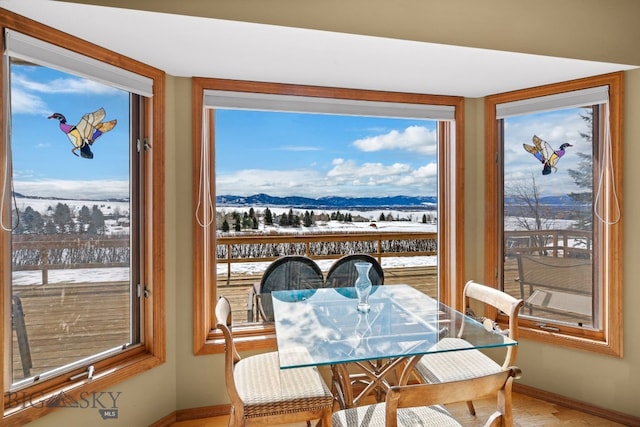 3310 Tumbleweed Dr, Bozeman, MT 59715 - dining area with baseboards and a mountain view