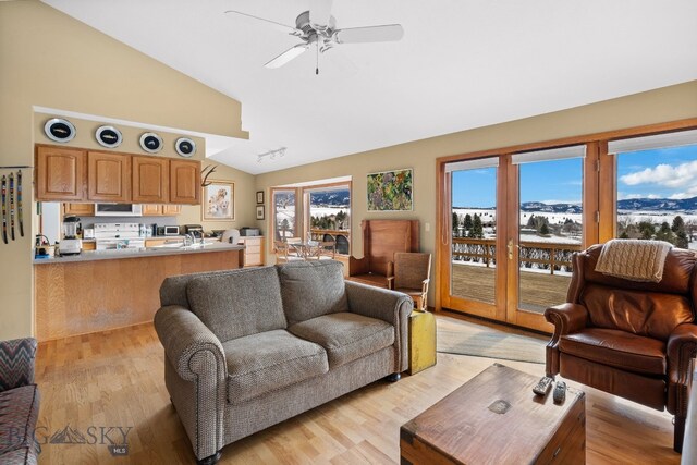 3310 Tumbleweed Dr, Bozeman, MT 59715 - living area featuring high vaulted ceiling, a ceiling fan, and light wood finished floors