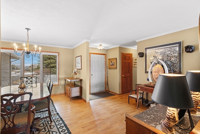 3310 Tumbleweed Dr, Bozeman, MT 59715 - living area with baseboards, a chandelier, ornamental molding, and light wood finished floors