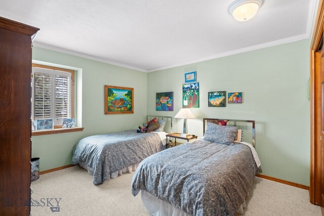 3310 Tumbleweed Dr, Bozeman, MT 59715 - carpeted bedroom featuring crown molding and baseboards