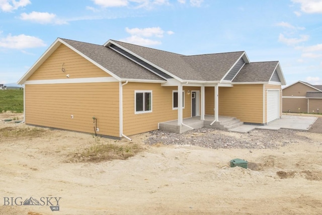 6 S Durango Trl, Three Forks, MT 59752 - view of front of home featuring roof with shingles and a garage