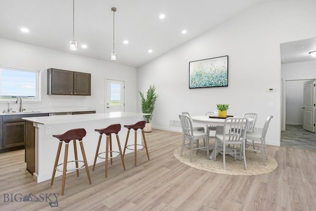 6 S Durango Trl, Three Forks, MT 59752 - dining area with light wood-type flooring, recessed lighting, and lofted ceiling