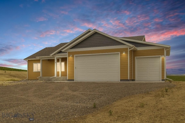 6 S Durango Trl, Three Forks, MT 59752 - ranch-style home featuring dirt driveway, a garage, and a shingled roof