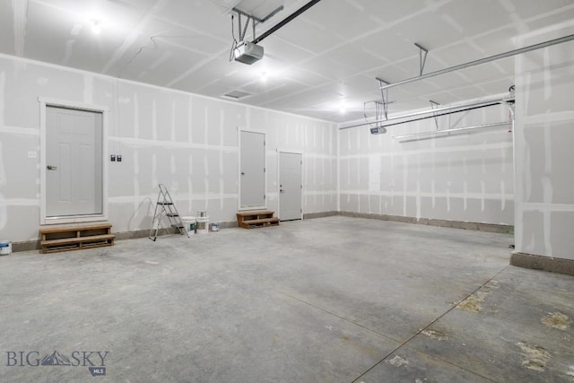 5 S Durango Trl, Three Forks, MT 59752 - garage with a garage door opener and baseboards
