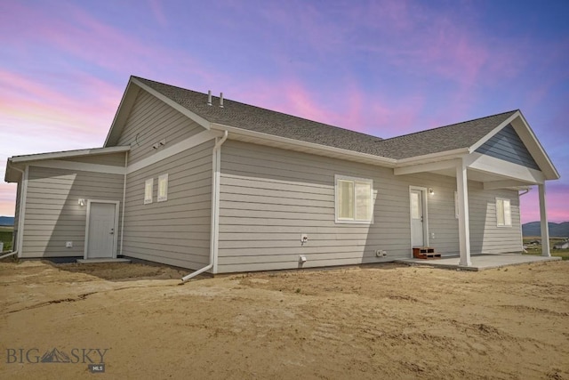 5 S Durango Trl, Three Forks, MT 59752 - rear view of property with roof with shingles and a patio