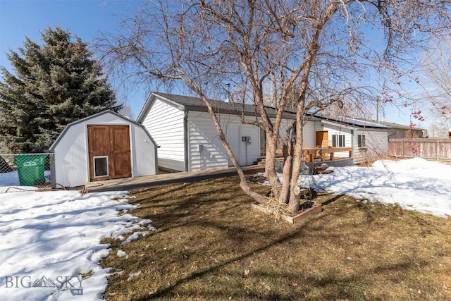 510 Flathead Ave, Bozeman, MT 59715 - snow covered house with a deck