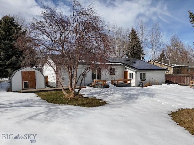 510 Flathead Ave, Bozeman, MT 59715 - snow covered rear of property with roof mounted solar panels
