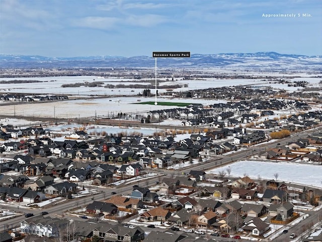 510 Flathead Ave, Bozeman, MT 59715 - snowy aerial view featuring a residential view and a mountain view