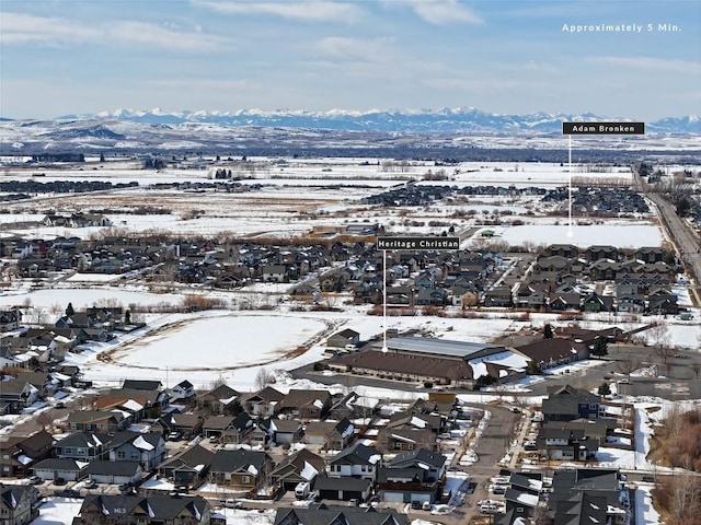510 Flathead Ave, Bozeman, MT 59715 - snowy aerial view featuring a mountain view and a residential view