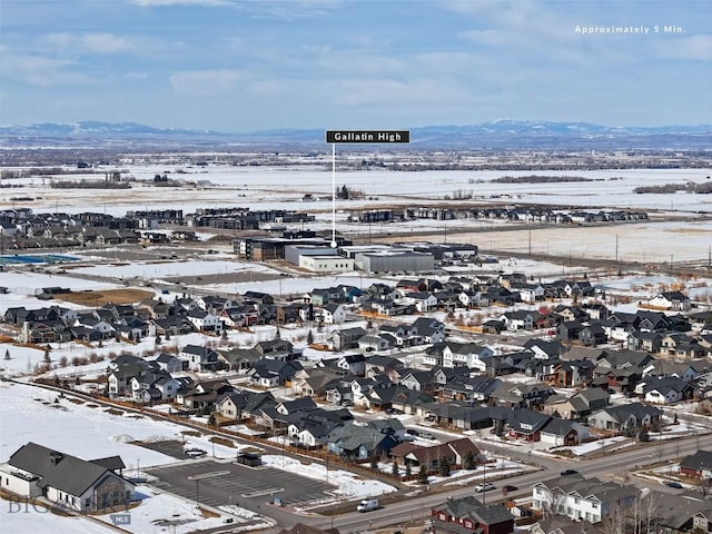 510 Flathead Ave, Bozeman, MT 59715 - snowy aerial view featuring a mountain view and a residential view