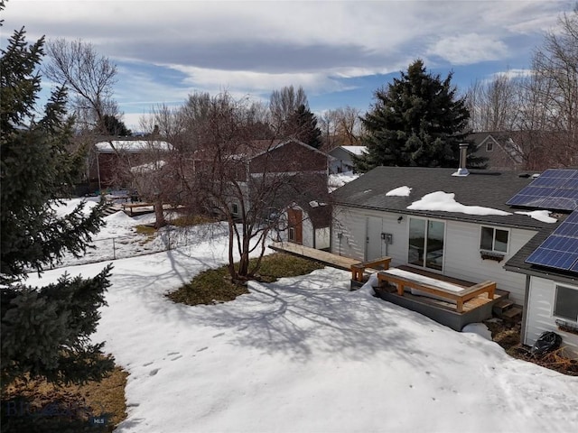 510 Flathead Ave, Bozeman, MT 59715 - snow covered rear of property with roof mounted solar panels