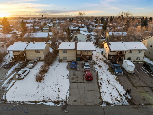 907 Montana St, Belgrade, MT 59714 - snowy aerial view with a residential view