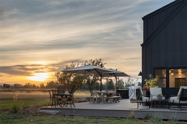7980 Balsam, Bozeman, MT 59718 - yard at dusk with a wooden deck