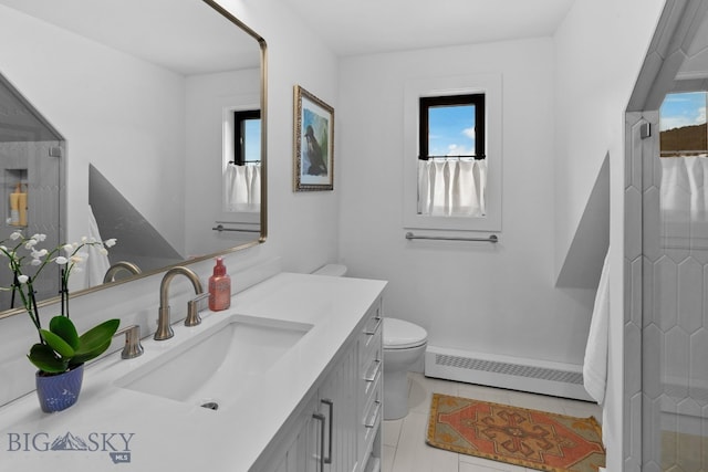 7980 Balsam, Bozeman, MT 59718 - full bath featuring baseboard heating, vanity, a shower with curtain, and tile patterned flooring