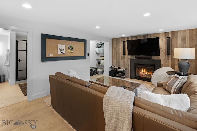 7980 Balsam, Bozeman, MT 59718 - living area with recessed lighting, a large fireplace, and light wood-style floors